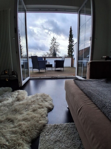 Exclusive loft with fireplace & sun terrace near the trade fair directly at the train station & parking lot