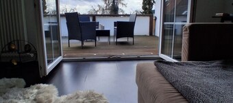 Exclusive loft with fireplace & sun terrace near the trade fair directly at the train station & parking lot