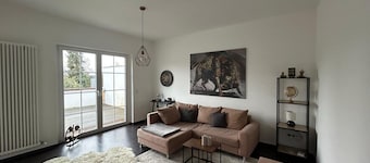 Exclusive loft with fireplace & sun terrace near the trade fair directly at the train station & parking lot