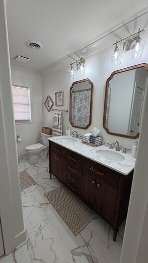 Hair dryer, towels, soap, toilet paper