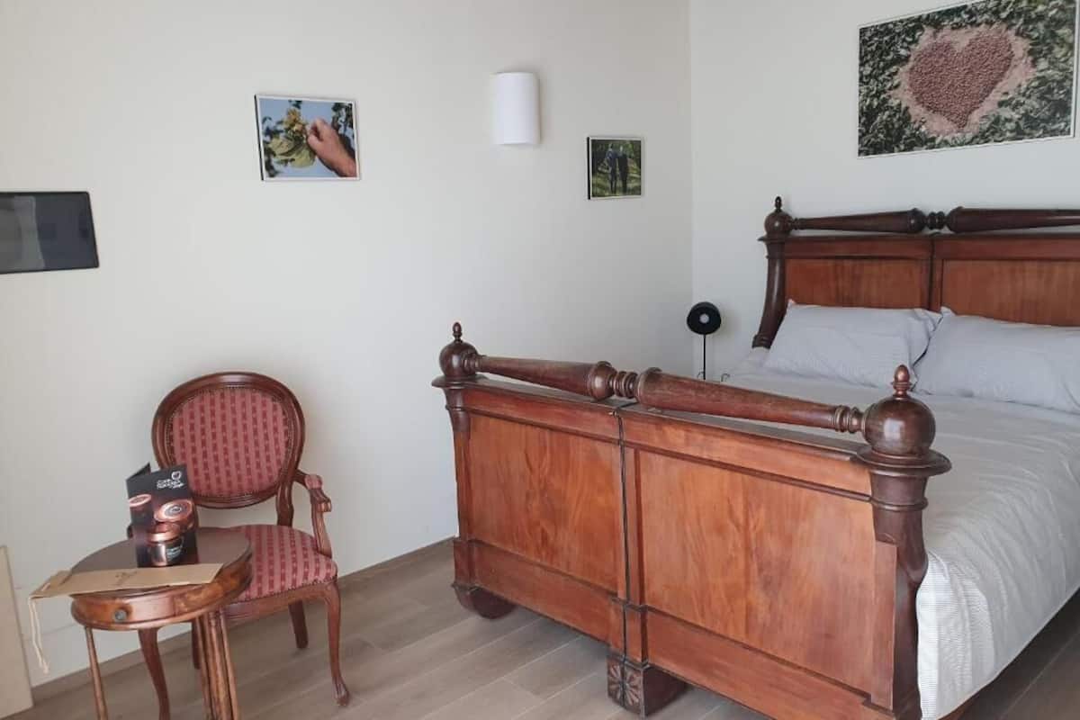 Double Room, Patio, Garden View | Blackout drapes, iron/ironing board, free WiFi