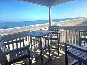 Outdoor dining - Sun-Filled Direct Oceanfront 2 bed/2 bath Condo in Family Friendly Surfside! (Surfside Beach)