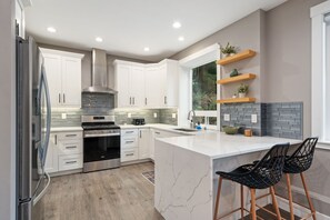 Fridge, microwave, oven, stovetop - Modern 4BR Bellingham Home w/ Deck & Garage (Bellingham)