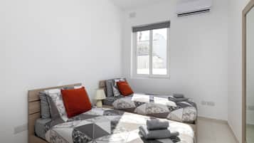 Penthouse, City View | Blackout drapes, iron/ironing board, free WiFi