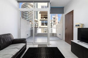 Penthouse, City View | Living area | Flat-screen TV - Stylish Penthouse - Terrace near Spinola (St. Julian's)