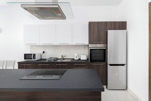 Cobertura, vista para a cidade | Cozinha privada