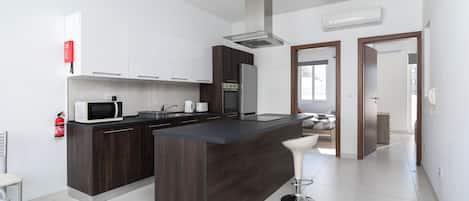Penthouse, City View | Private kitchen