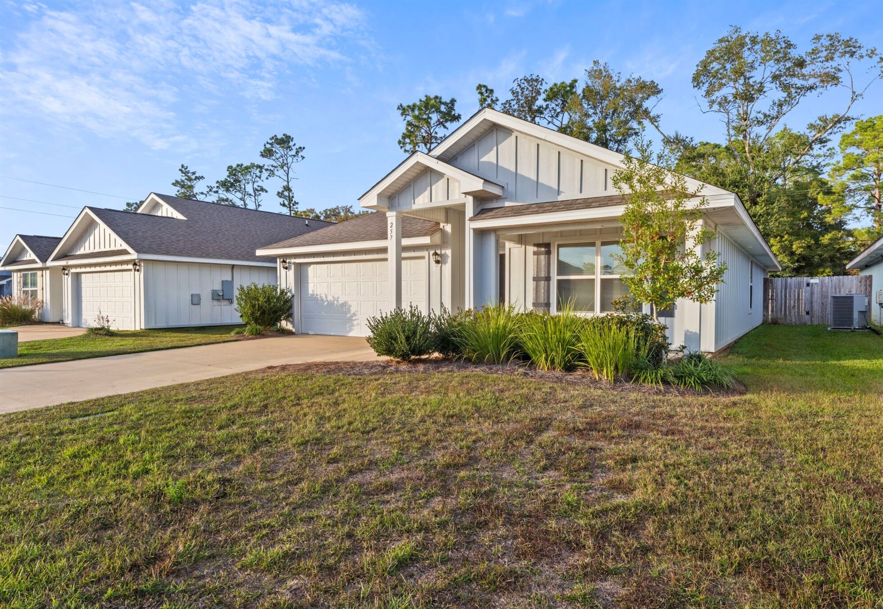 A front view of the home shows its peaceful neighborhood setting, offering a calm place to return to after busy days out.