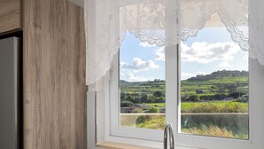 Apartamento, vistas al jardín | Cocina privada
