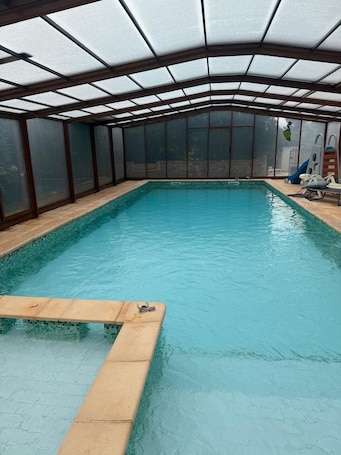 Indoor pool. La Pauz' Gite in large grounds with swimming pool ideal for families, groups (15 pers)