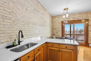 Fridge, microwave, oven, stovetop - Marina View | River Street Lofts | Lake Michigan (Elk Rapids)