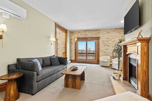 TV, fireplace, offices - Marina View | River Street Lofts | Lake Michigan (Elk Rapids)