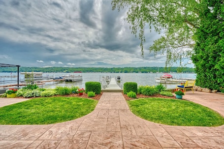 Terrace/patio. Peaceful 3-bedroom waterfront lakehouse on Conesus Lake.