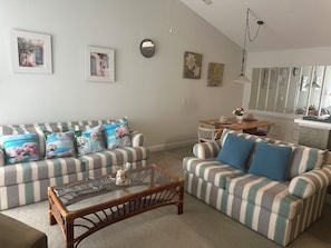Basic Condo, Pool View | Living area | 50-inch flat-screen TV with cable channels - Common 1 Brunswick Plantation (Calabash)
