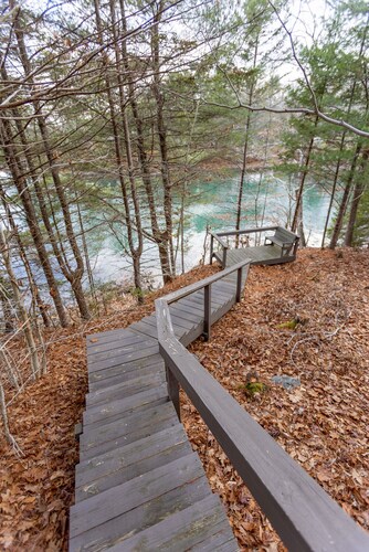 New! Upper and lower decks, central air conditioning, and a fully stocked kitchen!