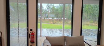 Large vacation home in southern Sweden by the lake Jetty, boat, pool
