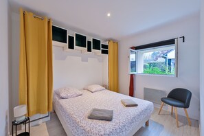 1 habitación, tabla de planchar con plancha, wifi gratis y ropa de cama 