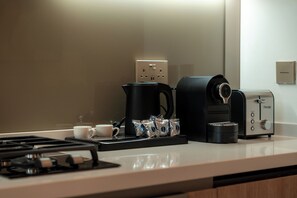 Superior Studio, 1 King Bed, Balcony, Canal View | Private kitchen | Cookware/dishes/utensils, dining tables - Heaven's Dreams Peninsula One Business Bay (Dubai)