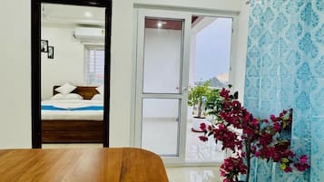 Apartment, 2 Bedrooms, City View | Living area | 43-inch flat-screen TV with digital channels, Netflix