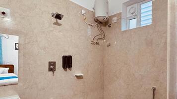Shower, rainfall showerhead, hair dryer, towels