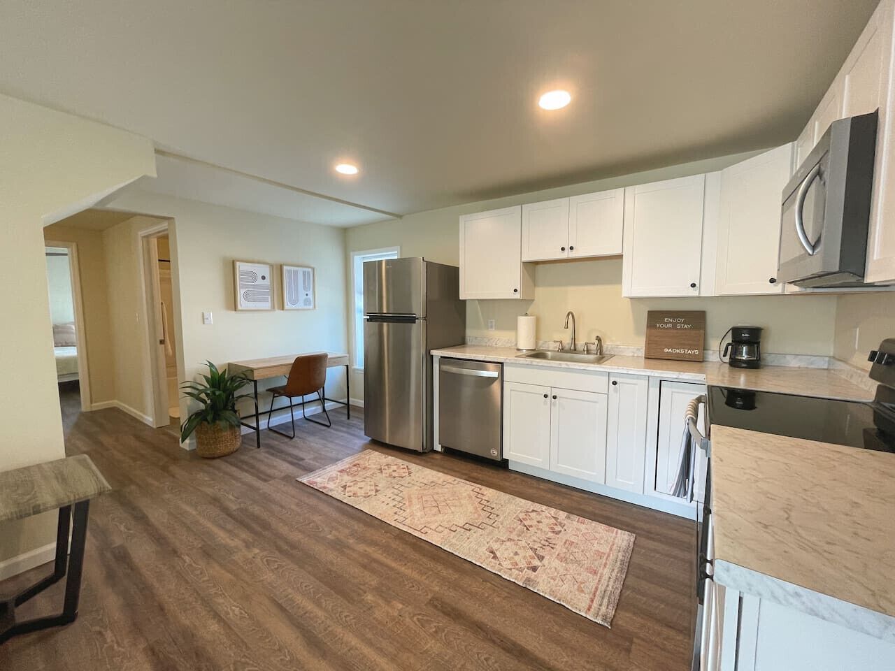 Fridge, coffee/tea maker, cookware/dishes/utensils