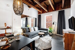 Suite Studio, 1 grand lit et 1 canapé-lit, cuisine | Coin séjour