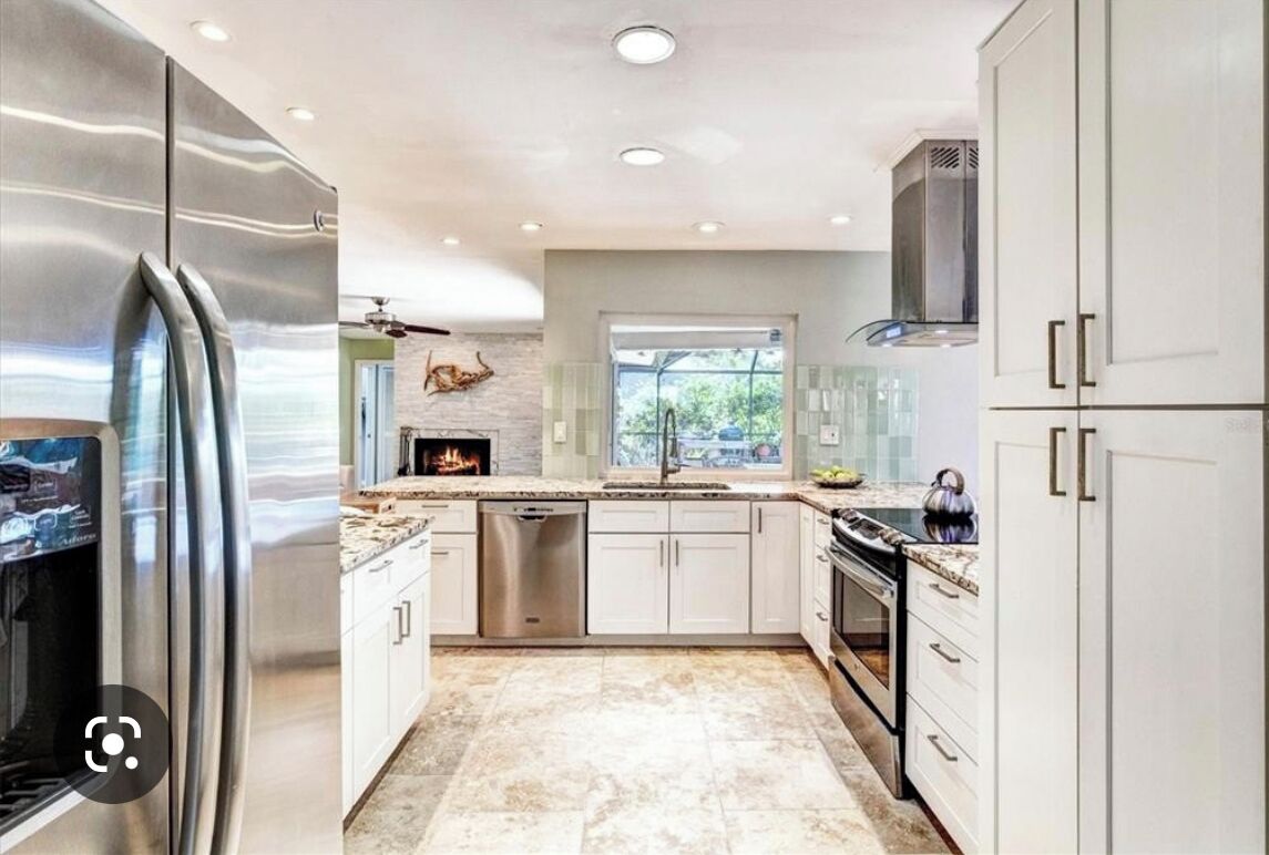 Refrigerador, microondas, horno y parrilla de estufa 