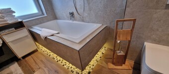 Quiet vacation apartment with terrace and garden - wellness use included.