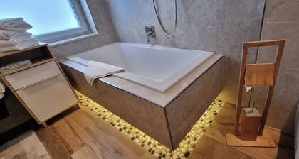 Quiet vacation apartment with terrace and garden - wellness use included.