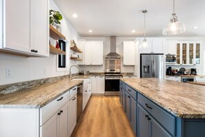 Fridge, microwave, oven, stovetop - Egg Harbor New Home on Golf Course w/ Game Room (Egg Harbor)