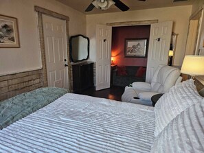 1 bedroom, desk, iron/ironing board, travel crib