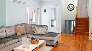 Smart TV, fireplace, table football, books