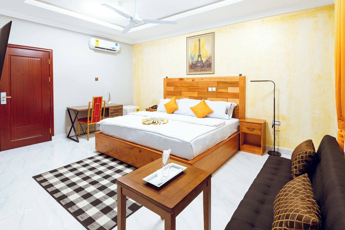 Deluxe Double Room, Courtyard View | Desk, laptop workspace, iron/ironing board (on request), free WiFi