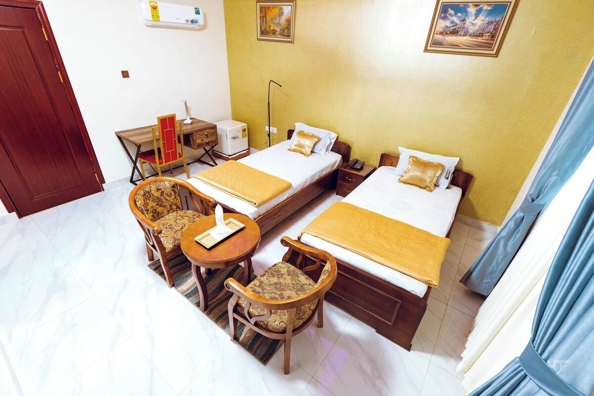 Standard Twin Room | Desk, laptop workspace, iron/ironing board (on request), free WiFi