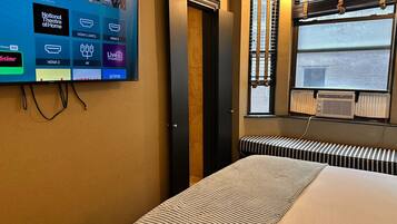 Blackout drapes, iron/ironing board, free WiFi