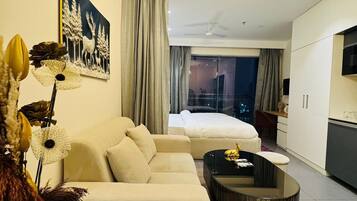 Luxury Studio Suite, City View | Desk, laptop workspace, free WiFi