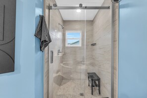 Jetted tub, hair dryer, towels, toilet paper