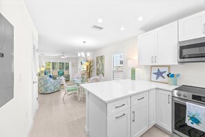 Fridge, microwave, oven, stovetop - Seashells 23: Bright, Beachy Comfort with Pool, Tennis, and Easy Beach Access (Sanibel)