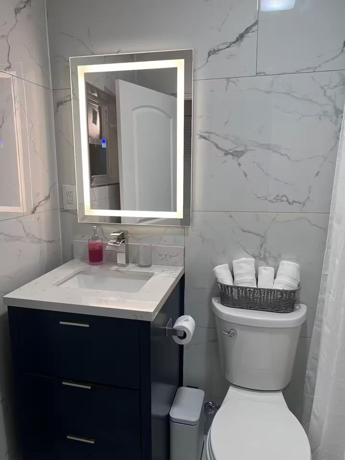 Hair dryer, towels, soap, toilet paper