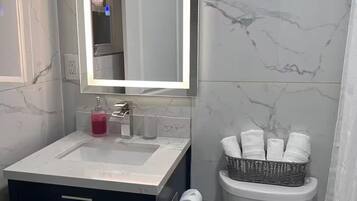 Hair dryer, towels, soap, toilet paper