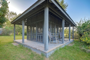 A gazebo with a covered porch, wooden benches, and a grassy lawn. - Century Old Farmhouse in Fulton: 6 Mi to Town! (Fulton)