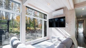 Living area - Mangata | SPA | Douche froide | SAUNA | Four pizza (Saint-Côme)