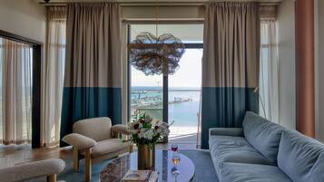 Deluxe Suite, 1 King Bed, Balcony, Sea View | Premium bedding, in-room safe, desk, laptop workspace