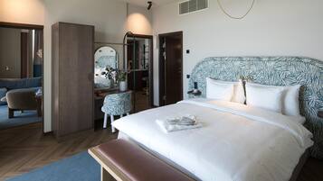 Deluxe Suite, 1 King Bed, Balcony, Sea View | Premium bedding, in-room safe, desk, laptop workspace