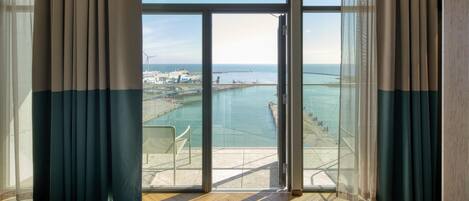 Deluxe Suite, 1 King Bed, Balcony, Sea View | Beach/ocean view