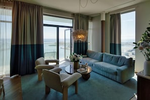 Deluxe Suite, 1 King Bed, Balcony, Sea View | Premium bedding, in-room safe, desk, laptop workspace