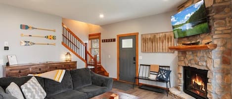 Smart TV, fireplace, books