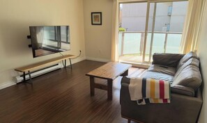 Living area - 2 bedroom condo available for FIFA (Burnaby)