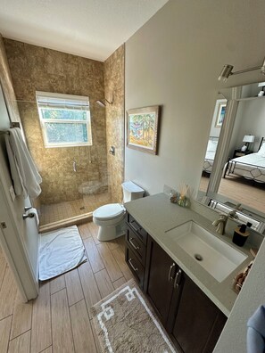 Shower, hair dryer, towels, soap - Central City Condominiums #202 2 BR/2BA (Sarasota)