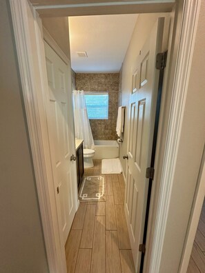 Shower, hair dryer, towels, soap - Central City Condominiums #202 2 BR/2BA (Sarasota)